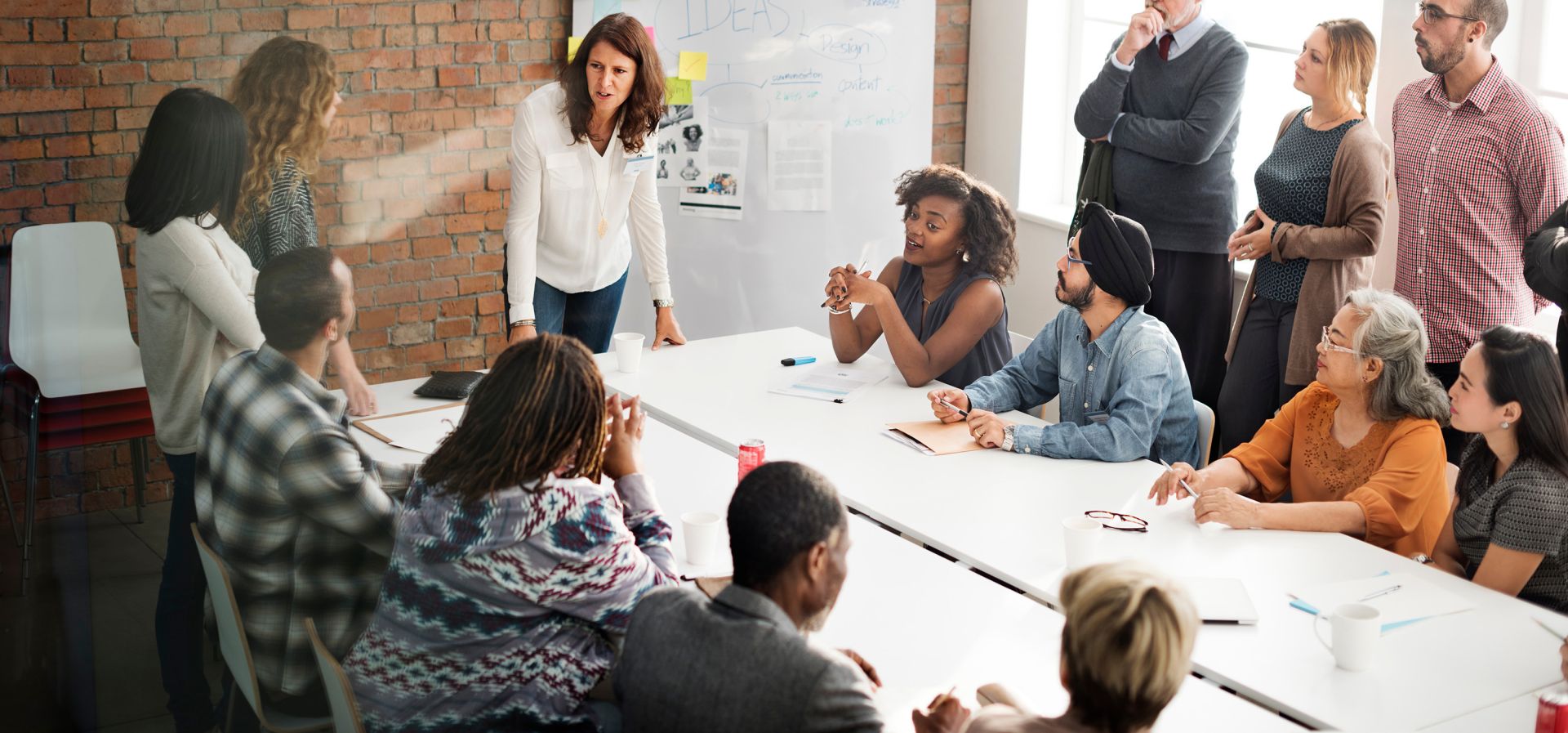 Group discussion at conference table.