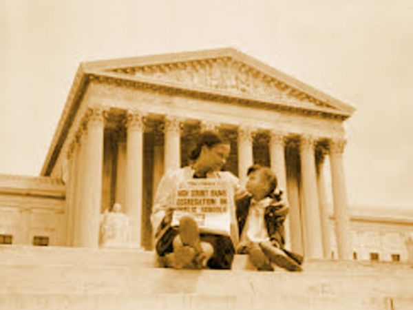 Woman and child on steps of Surpreme Court